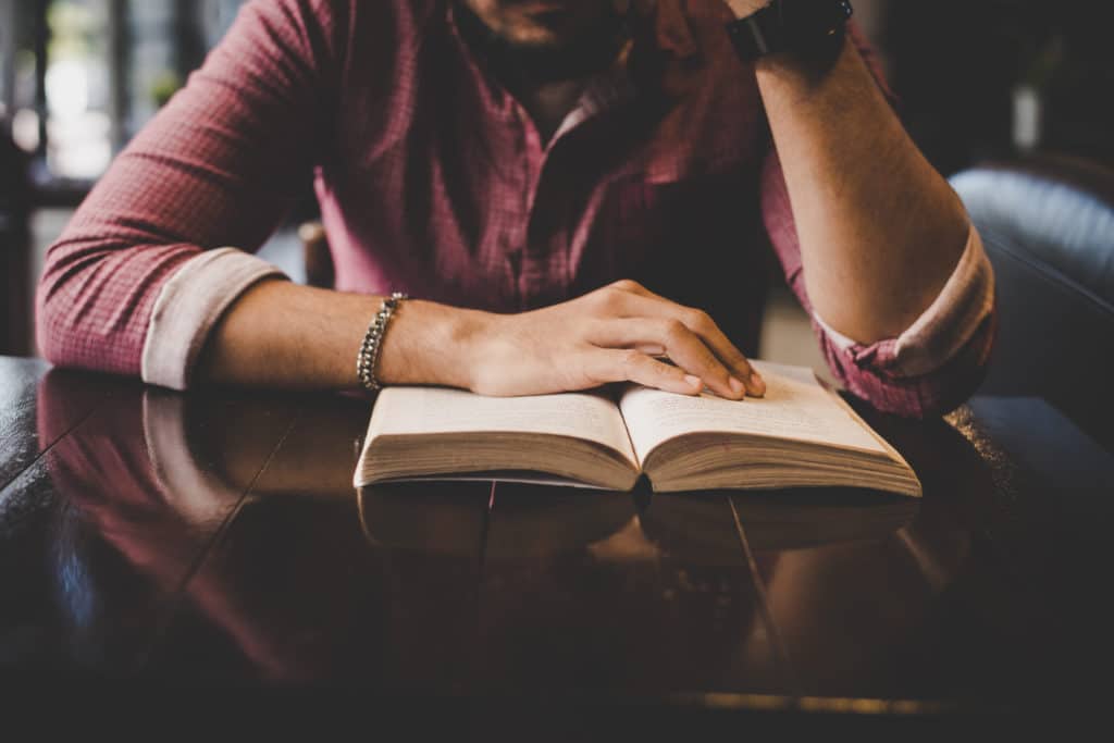 Bearded Man Studying Book